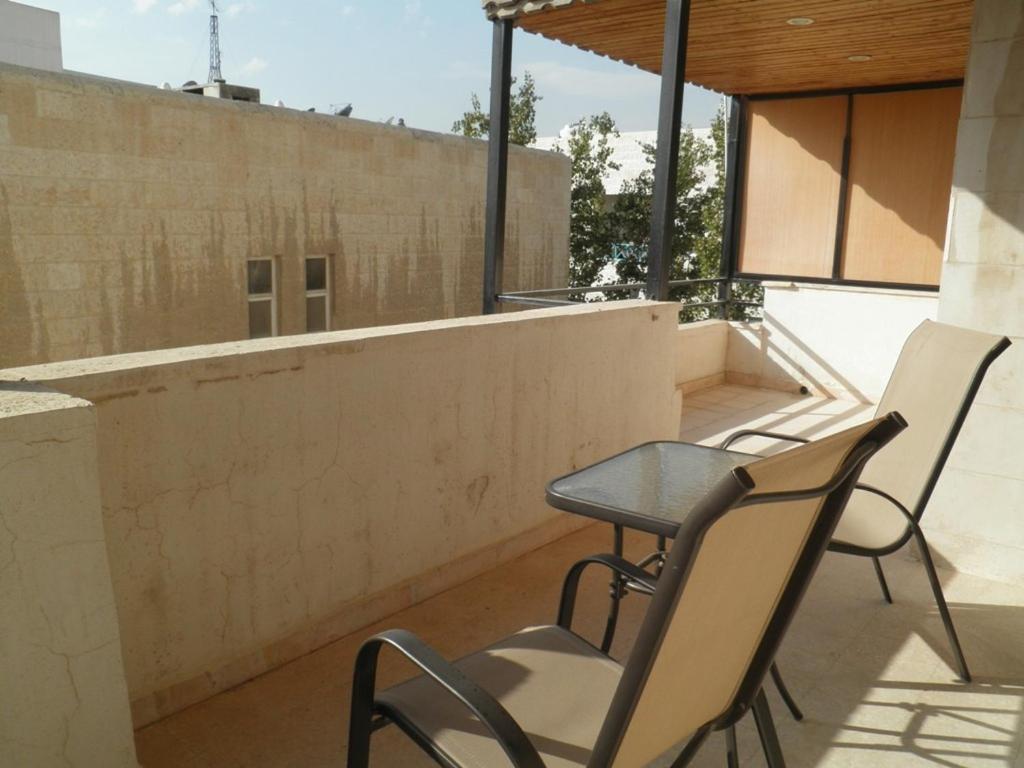 Granada Suites Hotel عمان الغرفة الصورة