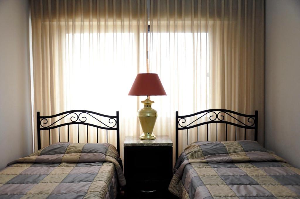 Granada Suites Hotel عمان الغرفة الصورة